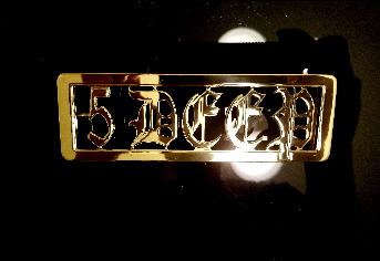 gold name belt buckle